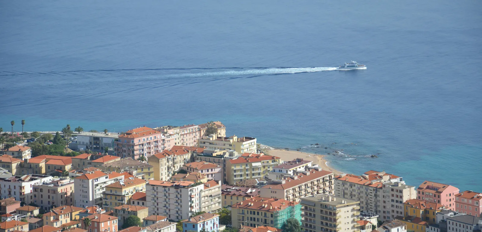 Aerial Photography of Buildings Near Sea